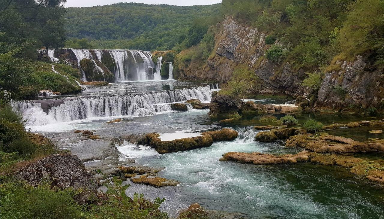 Nearby parks with paved walking paths and restrooms